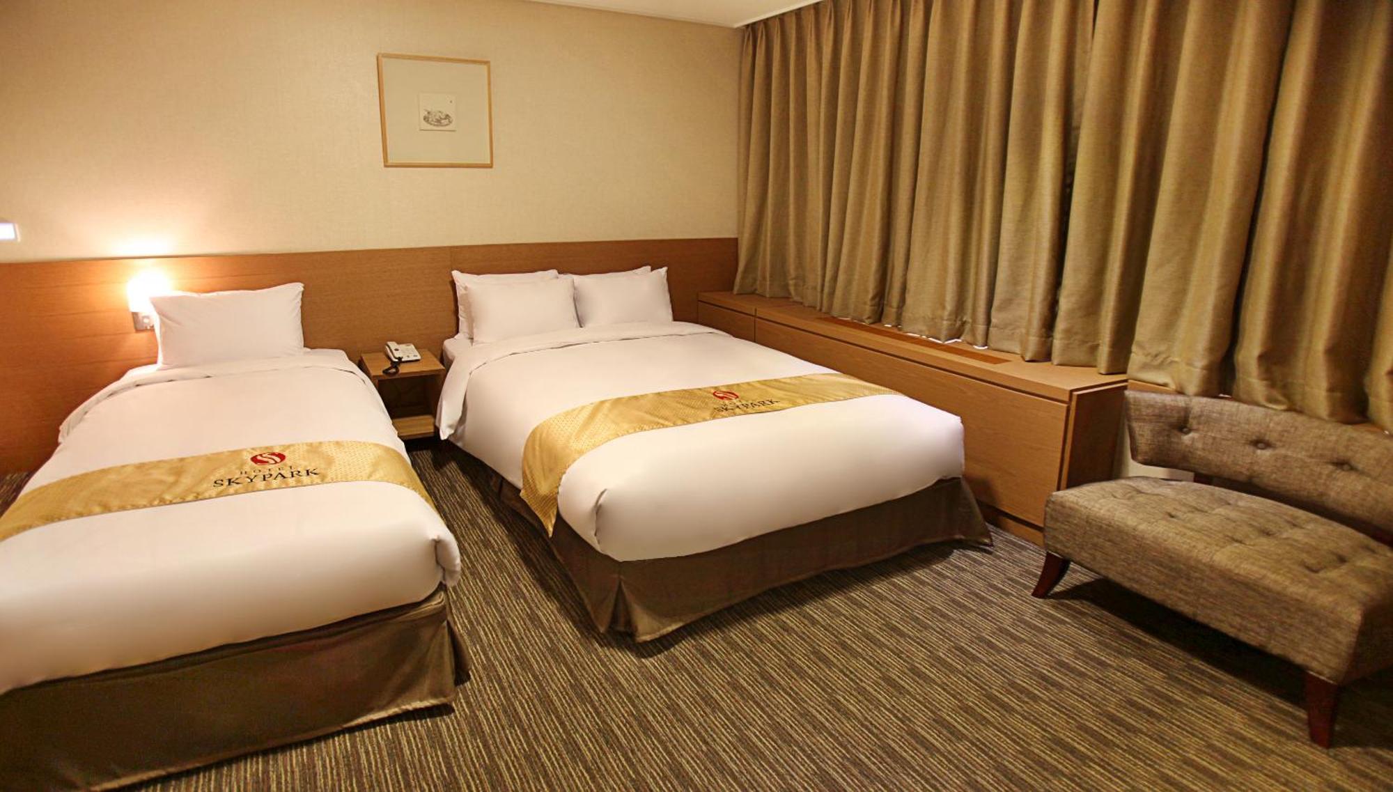 Hotel Skypark Central Myeongdong Сеул Номер фото